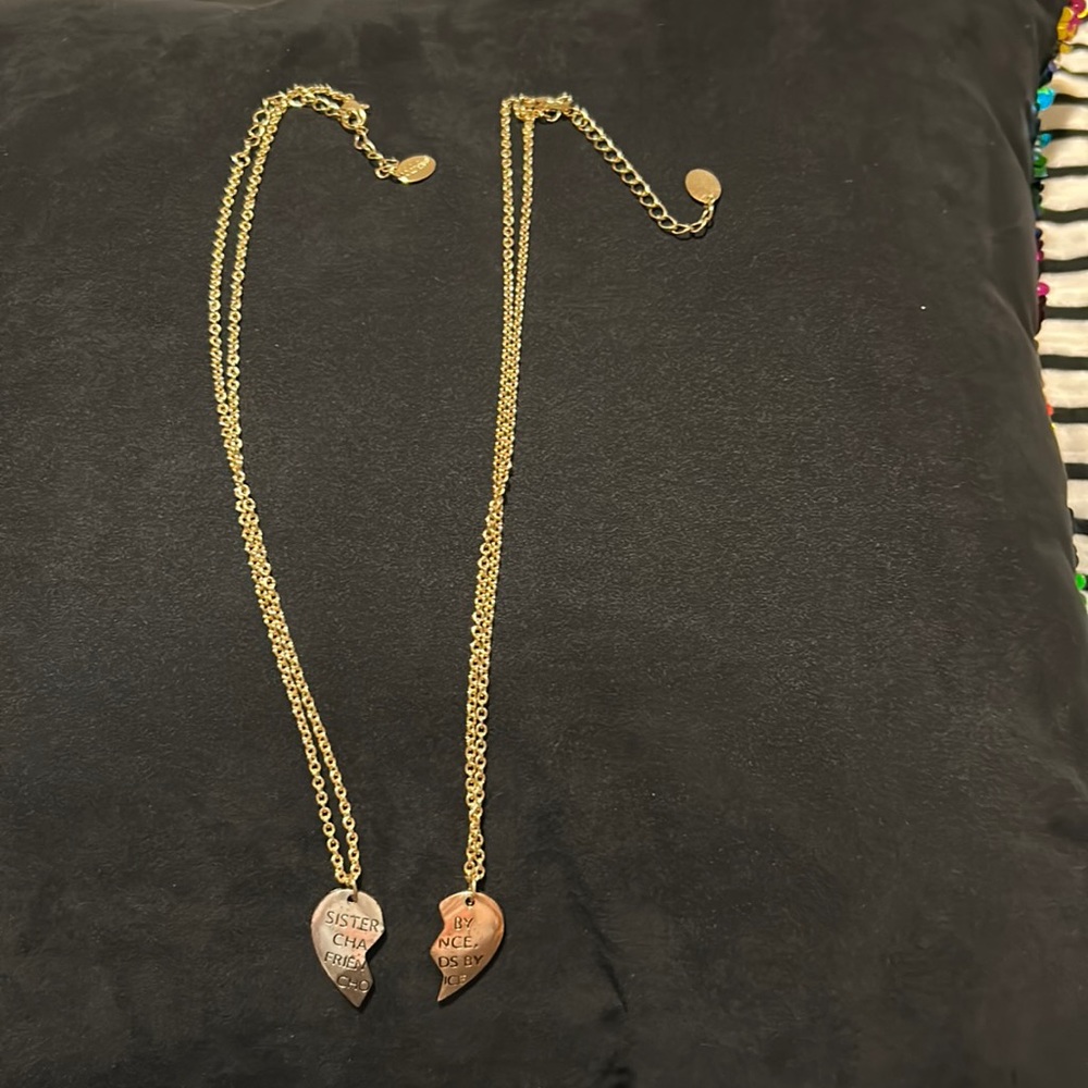 Kids two 18” sisters heart gold colored necklace with a 1” extender. Gently used